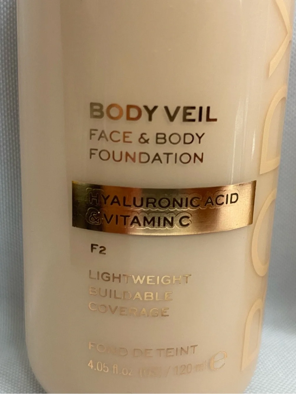 Revolution Glow Body Veil Face & Body Foundation - Beige/Cream Shades